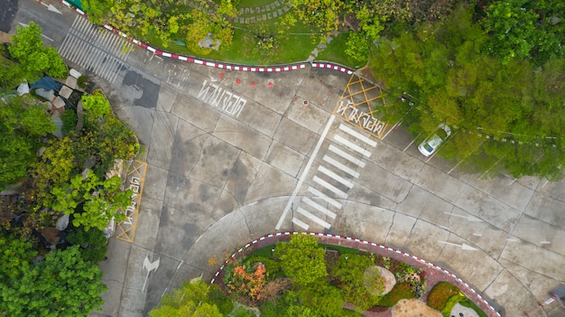 Aerial photo top view over pedestrian crossing on traffic road