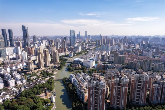 Aerial photo of urban architectural landscape skyline along Wuxi Canal