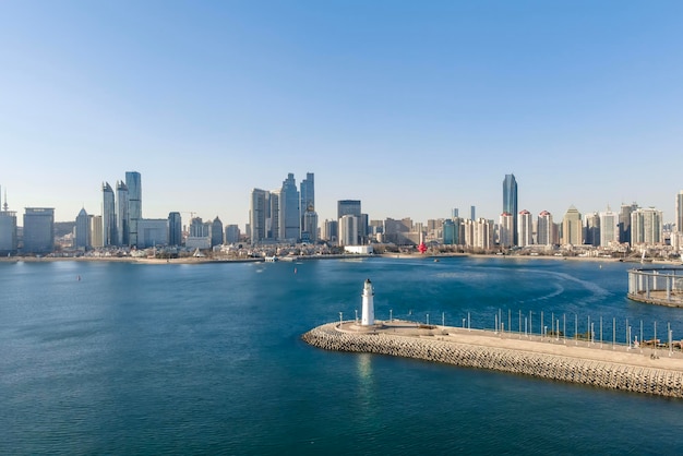 Aerial photo of urban landscape in Qingdao coastal bay area