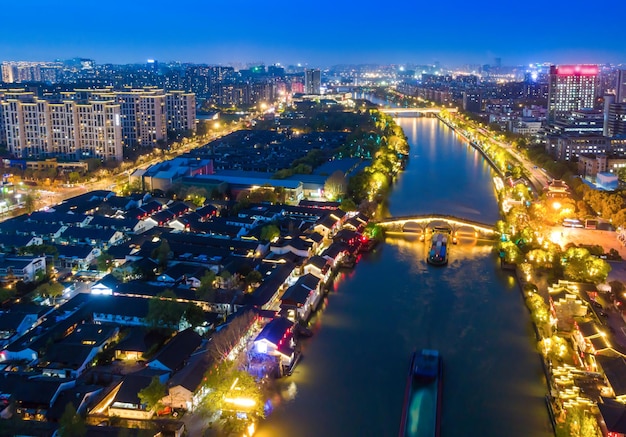 Aerial photography night view of Gongchen Bridge in Tangqi Ancient Town Hangzhou