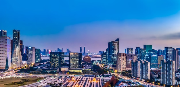 Aerial photography night view of modern city architecture landscape in Hangzhou, China