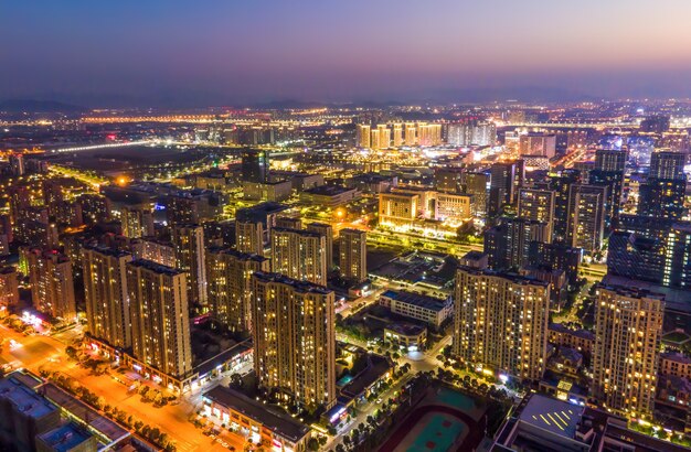 Aerial photography of the night view of the urban architecture skyline of Ningbo, Zhejiang