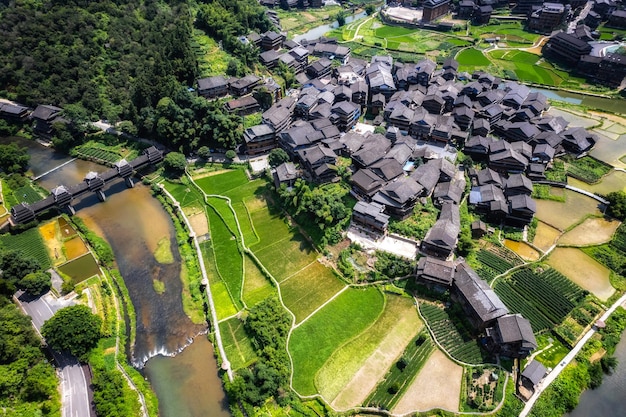 Aerial photography of the pastoral scenery of ancient Dong people's houses in Bazhai Chengyang Liuzhou