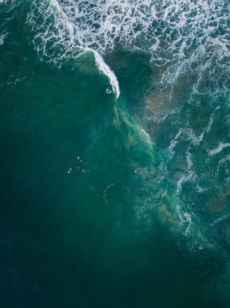 Aerial shot of sea waves under the sunlight - great for wallpapers