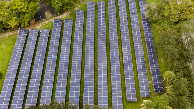 Aerial shot of solar panels in a cascade in the field in Florida