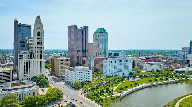 Aerial summer downtown Columbus Ohio skyscrapers with Scioto River