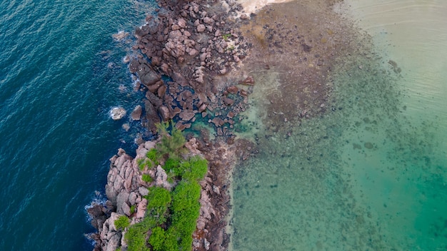 Aerial top angle drone view part of small islands Koh Huapin clear blue sea beach, Bo Thonglang bay, travel destination at Bang Saphan, Prachuap Khiri Khan, Thailand, calm rock beach blue sea