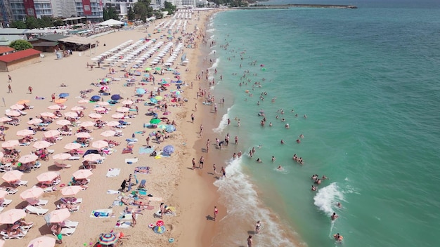 Aerial top view of Bulgaria's Golden Sands resort during the summer season an array of hotels pools and crowds of people enjoying the sea