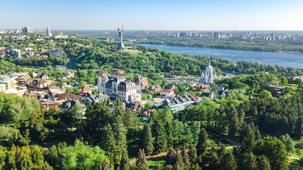 Aerial top view of Kiev city from above, Kyiv skyline and Dnieper river cityscape in spring, Ukraine