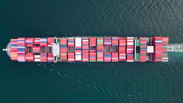 Aerial top view large container ship transporting cargo to import export for logistics business