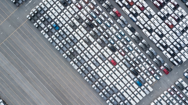 Aerial top view new cars lined up for import  export business.