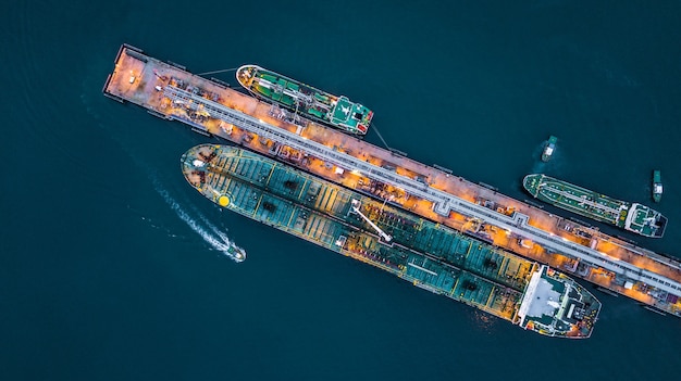 Aerial top view of oil tanker ship at the port