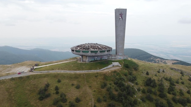 Aerial view of an abandoned soviet monument Buzludzha made in the style of brutalism Bulgaria