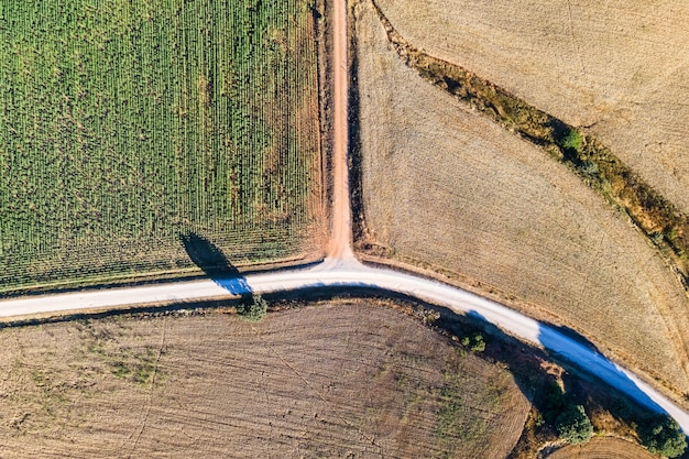 Aerial view of agriculture fields and rural roads in the countryside. Segovia.