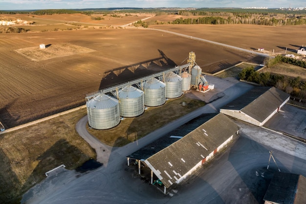 Aerial view of agroindustrial complex with silos and grain drying line