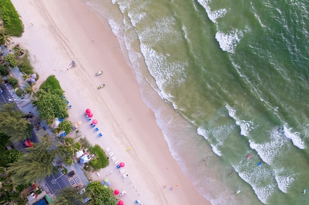 Aerial view of amazing beach with people relax on the beach sea Beautiful Patong beach Phuket Thailand Amazing sea beach sand tourist travel destination in andaman sea Travel and tour concept