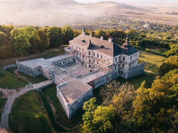 Aerial view of ancient castle at sunset Pidhirtsi Castle in the western part of Ukraine