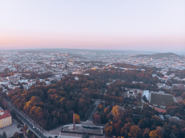 Aerial view of autumn city park on sunset