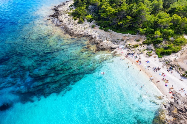 Aerial view on the beach and azure sea Beach and sea from air Place for resting Summer seascape from drone Croatia landscape Travel image