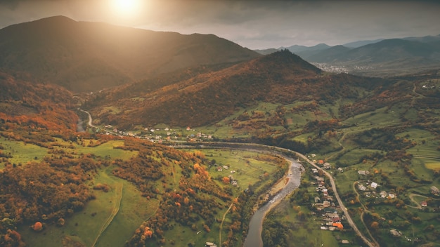 Aerial view beautiful canyon village located along the river dramatic autumn mountain landscape with