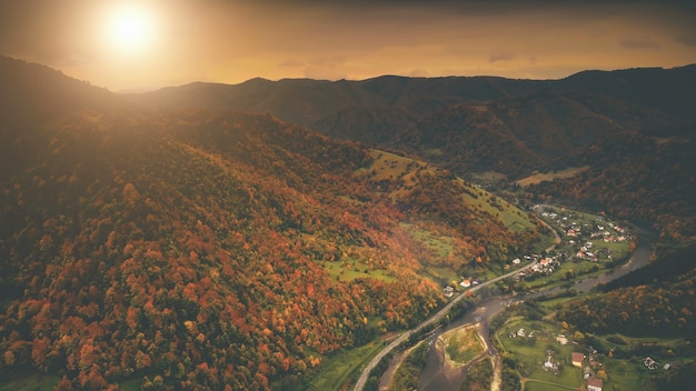 Aerial view beautiful canyon village located along the river dramatic autumn mountain landscape with