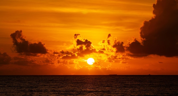 Aerial view Beautiful view sunset over sea surface beautiful wave Amazing light sunset or sunrise sky over sea beach with wave crashing in the oceannature background