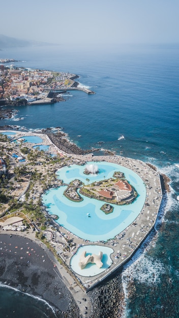 Aerial view of beautifully designed saltwater pools Lago Martianez in Puerto de la Cruz, Tenerife, Canary Islands, Spain