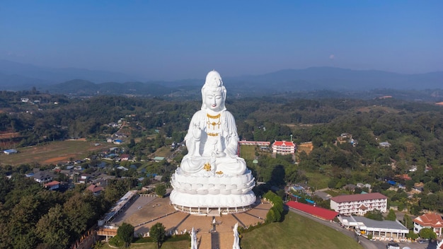 Aerial view of Big Buddha Guan Yin Buddha in Wat Huay Pla Kung temple Tourist attraction landmark in Chiang Rai province of Thailand