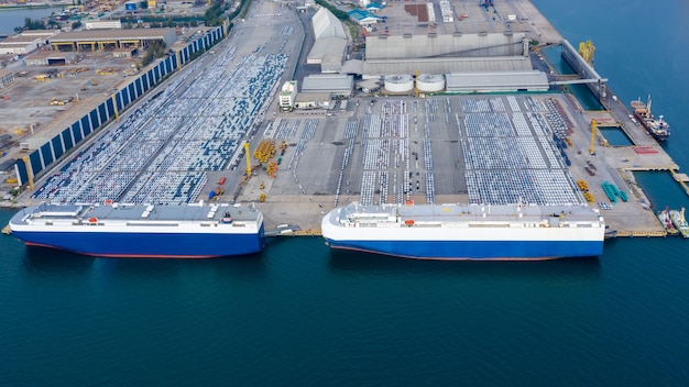 Aerial view Car loading to Large RoRo Roll on off Carrier vessel for shipping to worldwide