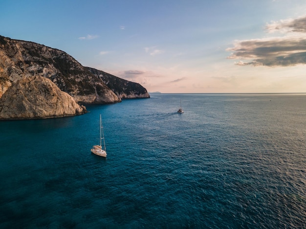 Aerial view of chats in the bay sunset above the ionian sea