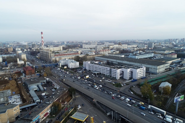 Aerial view of the city district A wide road passes through the city