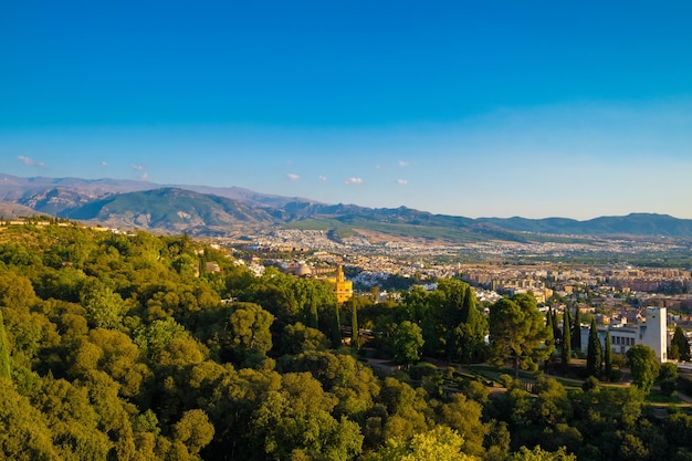 Aerial view of the city of Granada with Sierra Nevada on background