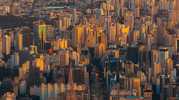 Aerial view of city lit up at night