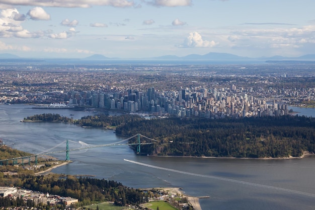 Aerial view of the City with Stanley Park and Downtown in the Background