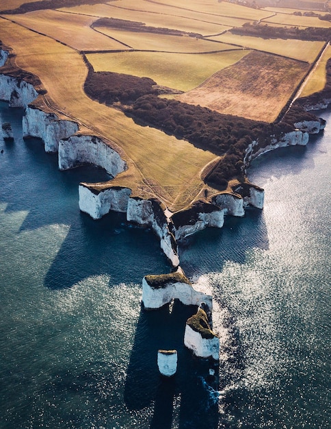 Aerial view of cliff by sea