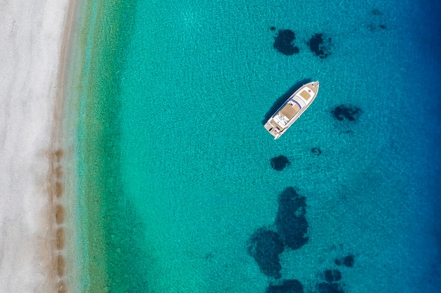 Aerial view on the coast line. Beach and sea from air