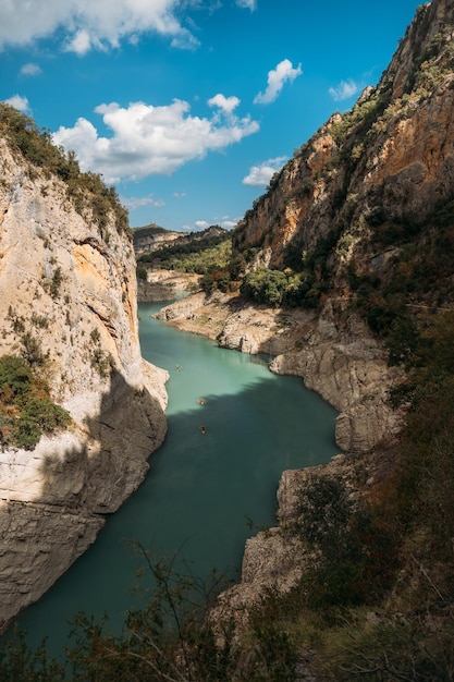 Aerial view of the Congost de Montrebei gorge and kayakers on sunny day in Catalonia Spain