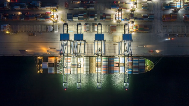 Aerial view container ship carrying cargo boxes