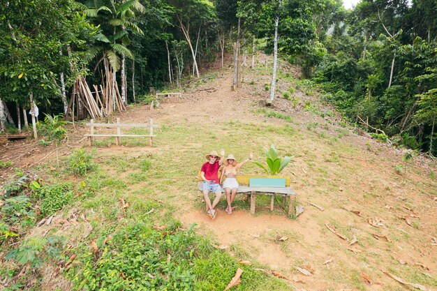 Aerial view of couple spending time in the jungle