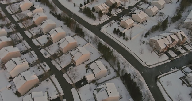 Aerial view of the courtyard residential building snow covered streets the small town in winter day