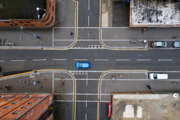 Aerial view of a crossroad junction in a town in the UK