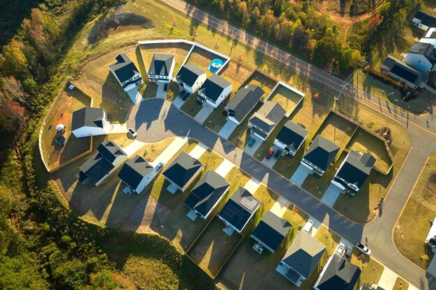 Aerial view of cul de sac at neighbourhood road dead end with densely built homes in South Carolina residential area Real estate development of family houses and infrastructure in american suburbs