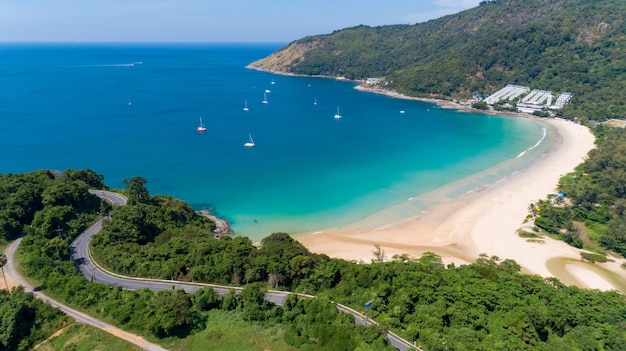 Aerial view of curve road along the Naiharn beach at Phuket Thailand