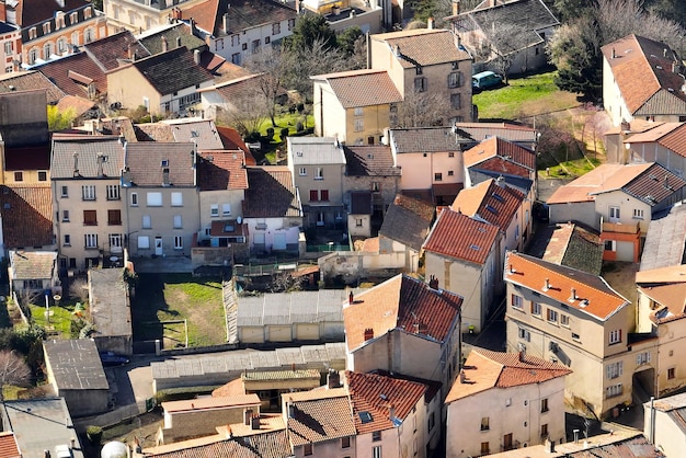 Aerial view of dense historic center of Thiers town in PuydeDome department AuvergneRhoneAlpes region in France Rooftops of old buildings and narrow streets