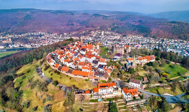 Aerial view of Dilsberg, a town with a castle on the top of a hill surrounded by a Neckar river loop. Germany, Baden-Wurttemberg