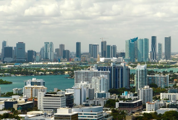 Aerial view of downtown office district of Miami in Florida USA on bright sunny day High commercial and residential skyscraper buildings in modern american megapolis