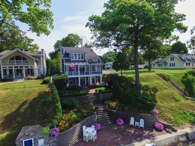 Aerial View of Elegant Suburban Homes with Lush Gardens