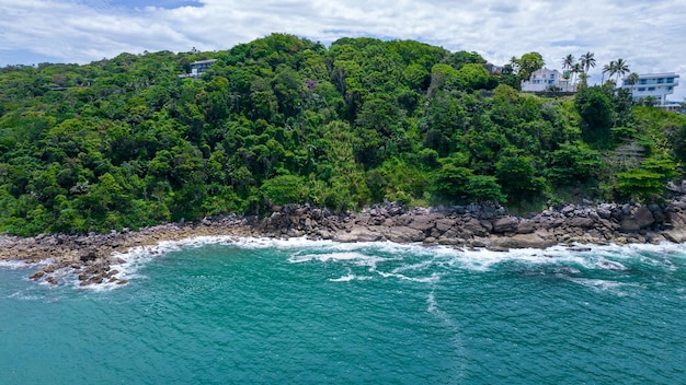 Aerial view of Enseada beach in Guaruj, Brazil. rocks and blue sea on the coast.