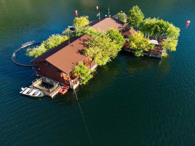 Aerial view of a floating house in Vacha Dam Devin Municipality Bulgaria