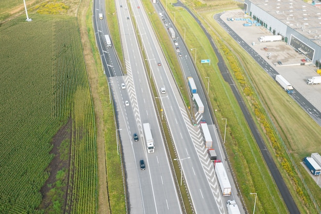 Aerial view of the freeway with various connections. Vehicles travel on the roads. Modern roads Poland